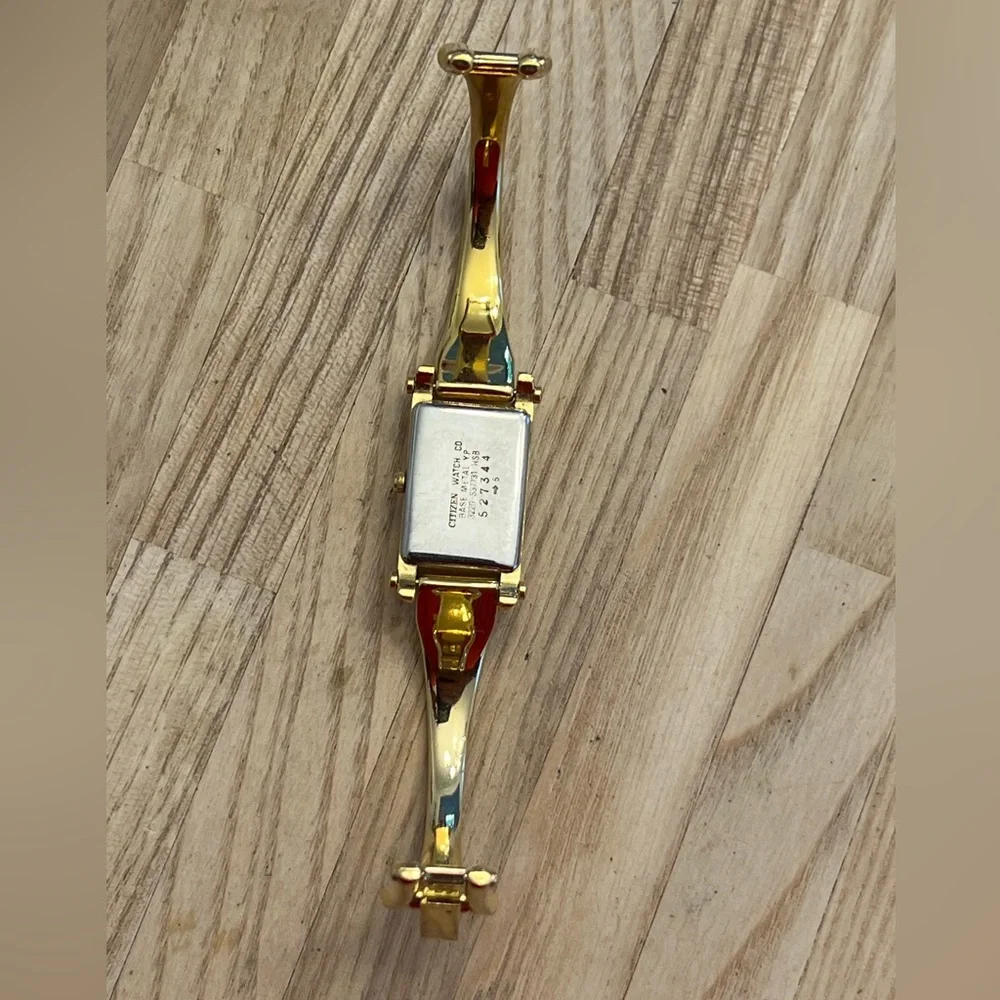 Citizen Ladies Watch Gold-Tone Bangle Bracelet Rainbow Pearl Rectangular Dial